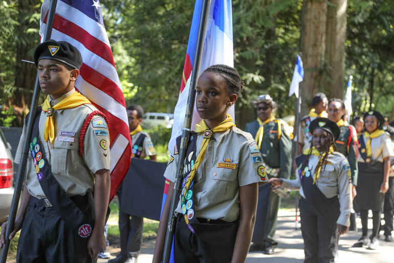 Club marching with flags