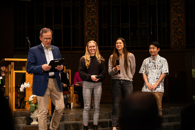 Students discuss notable academic achievements.
