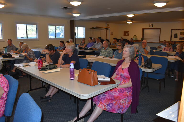 The fellowship hall at the Nampa Church was nearly full.