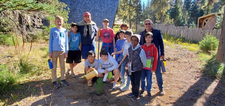 boys planting a tree