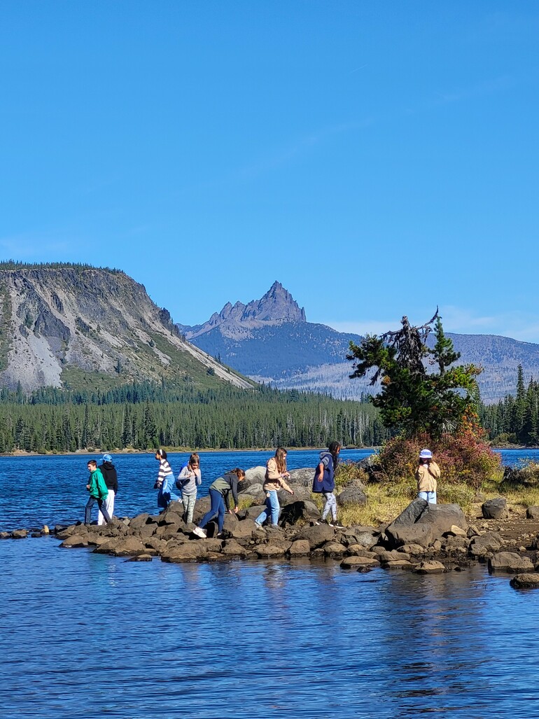 students out on the point in the lake