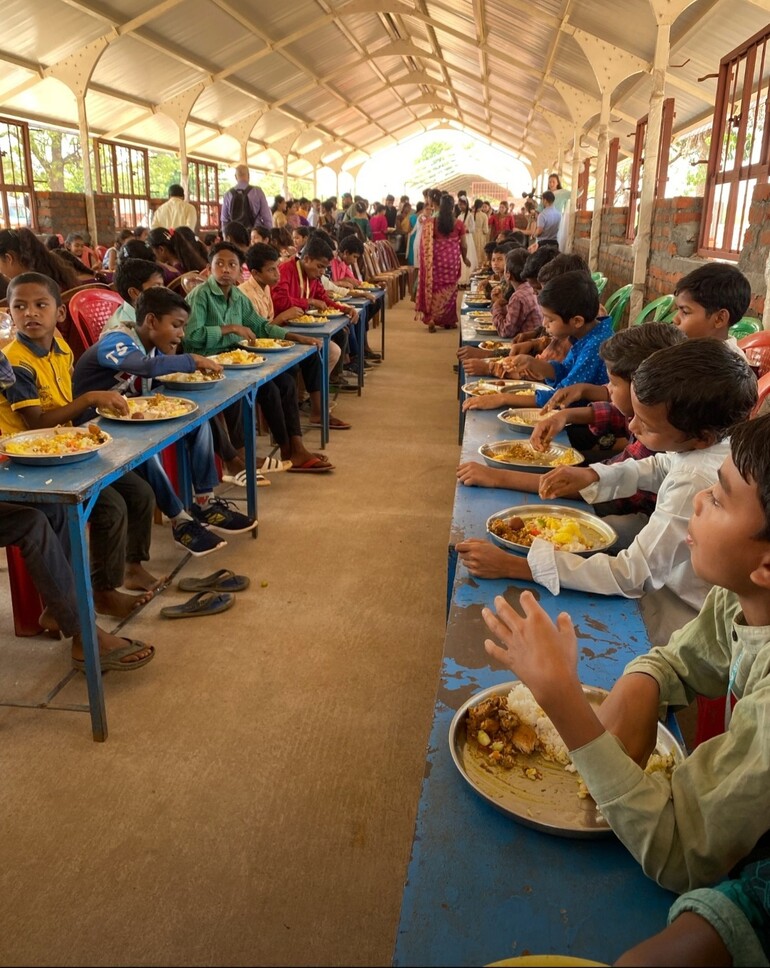 people eating in Indian cafeteria
