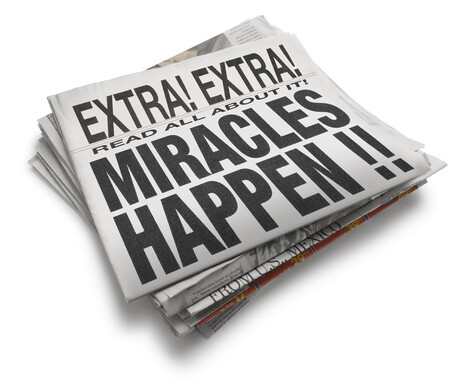 Newspaper with big headline that says, &quot;Miracles Happen.&quot;