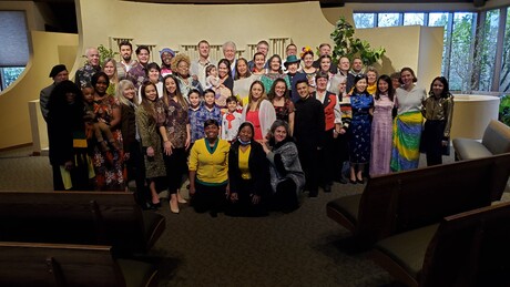 Group photo with people representing many cultures