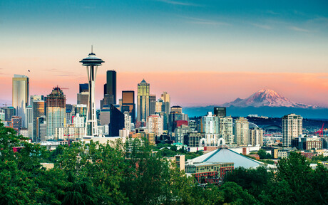 Seattle Skyline and Mount Rainier at Sunset on a clear summer day.