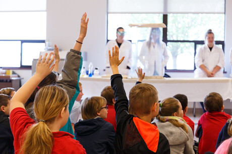 Students interact with science teachers' presentation.