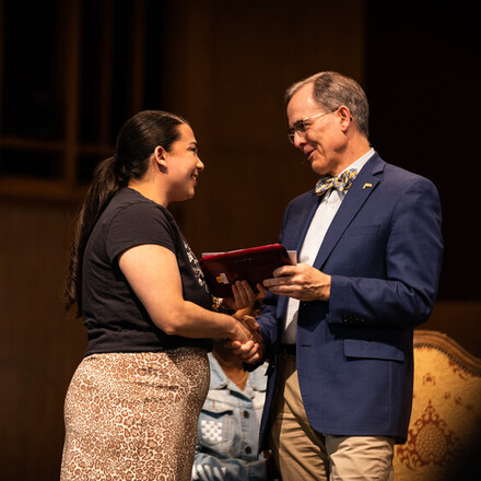 Amanda Ponce receives award.