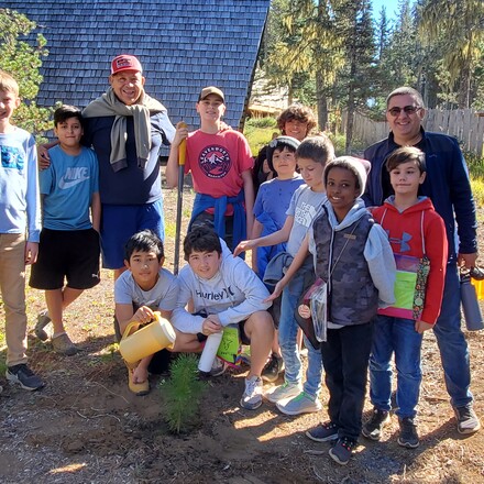 boys planting a tree