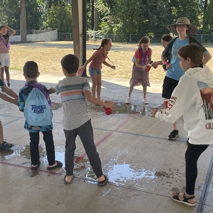 children playing water games