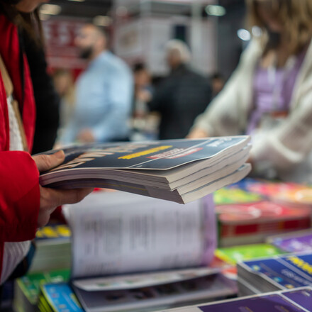 women is buying books book shop horizontal still