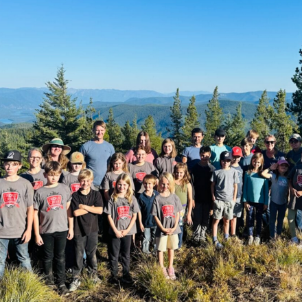 students assembled outdoors for a group photo