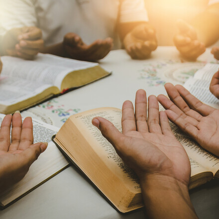Christian Bible Study Concepts Christian followers are studying the word of God in churches.