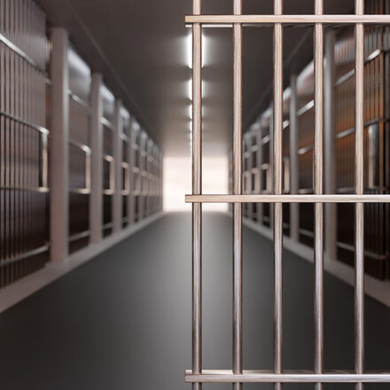 Prison building corridor, jail cell and open metal bars door