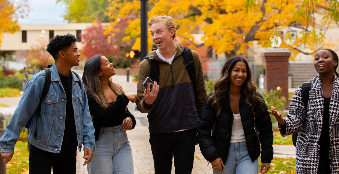 Group of students walk outside